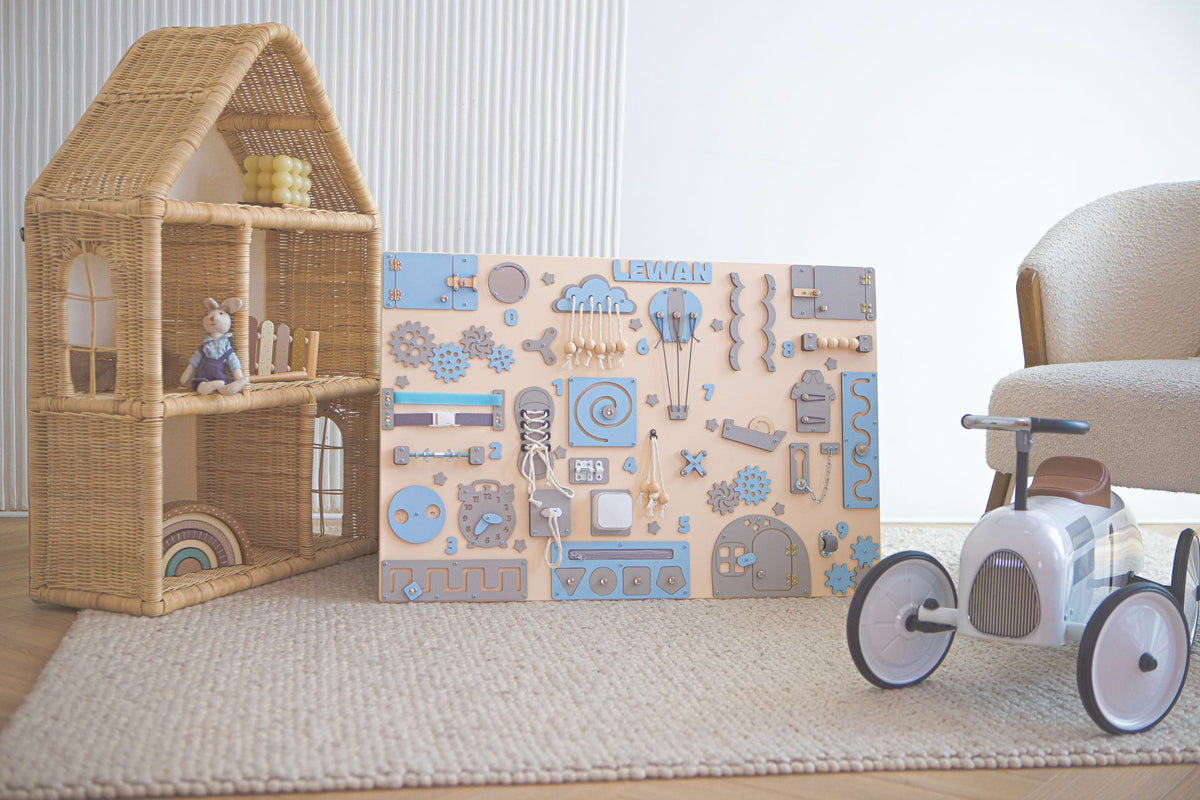 Blue craft busy board with locks and switches