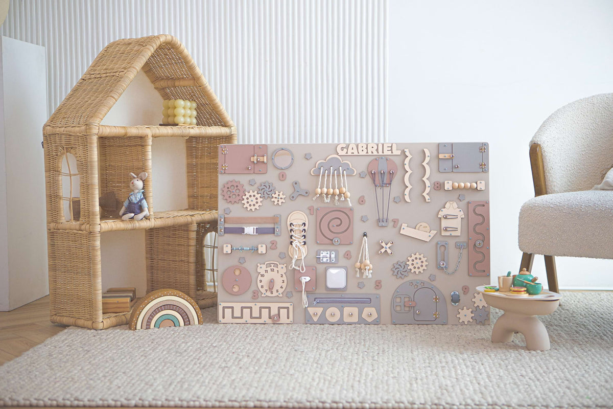 Wooden sensory board with interactive mechanisms